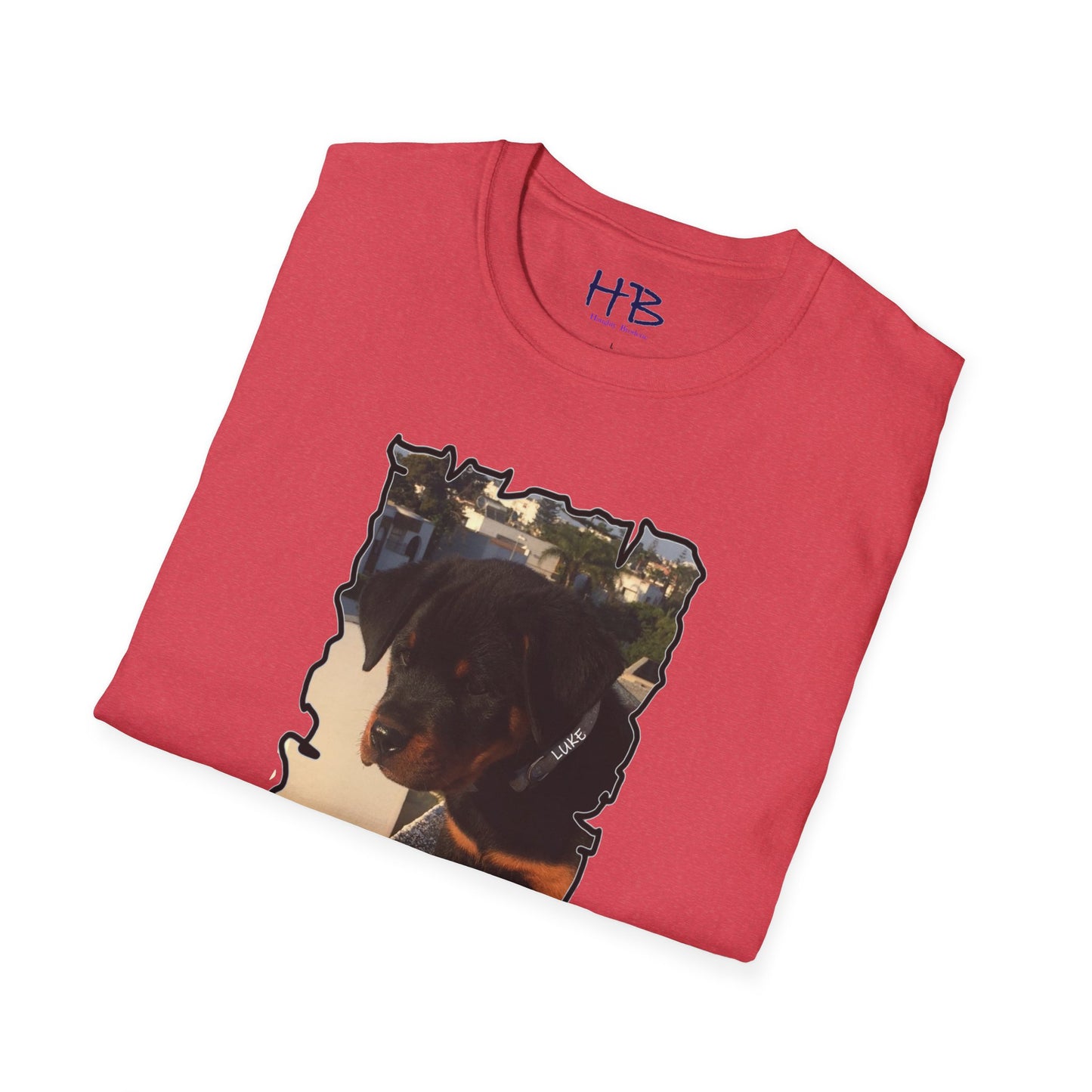 Baby Rottie Luke peeking over the roof