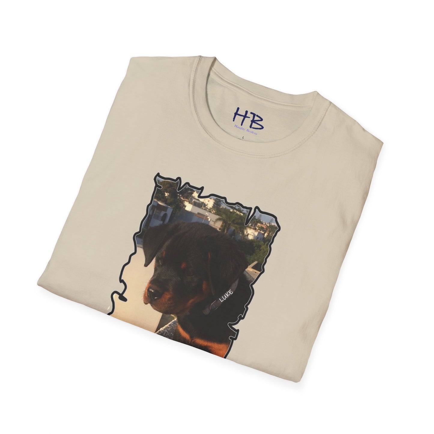 Baby Rottie Luke peeking over the roof