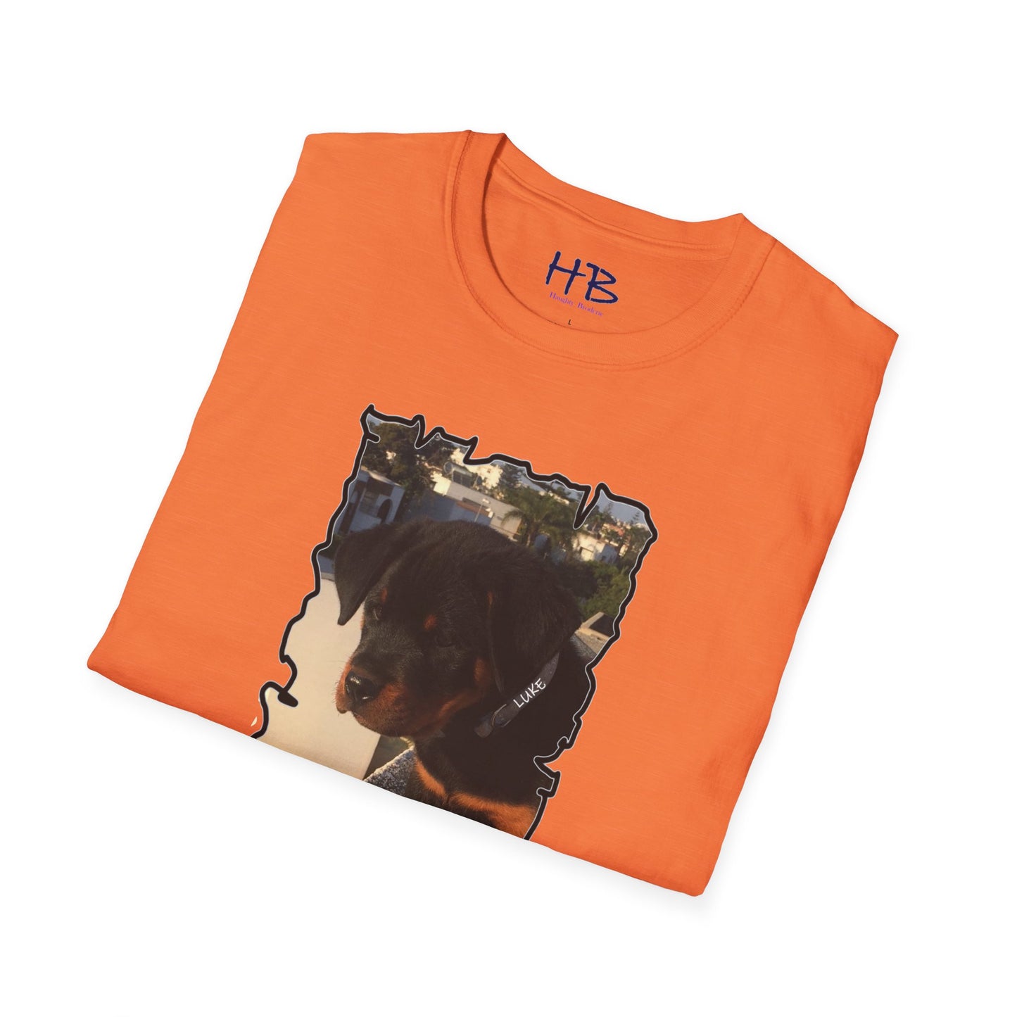 Baby Rottie Luke peeking over the roof