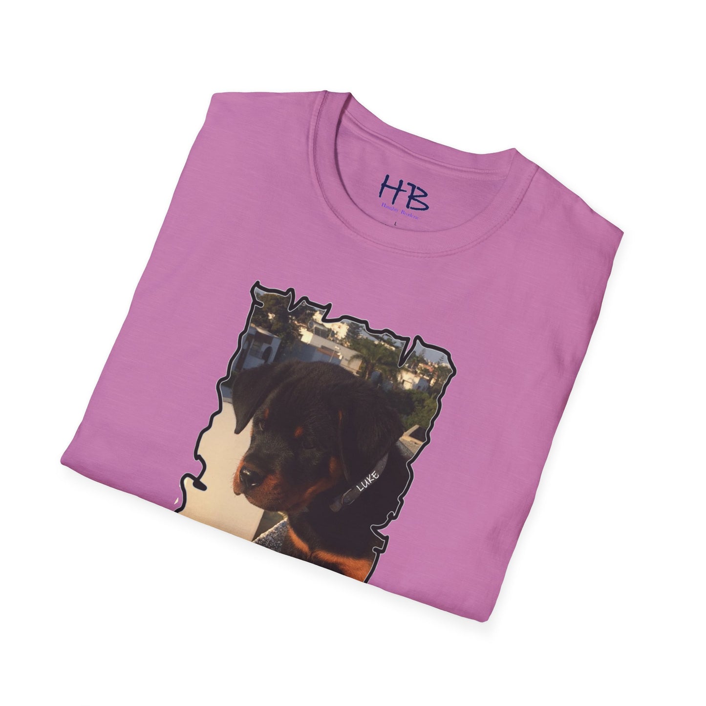 Baby Rottie Luke peeking over the roof