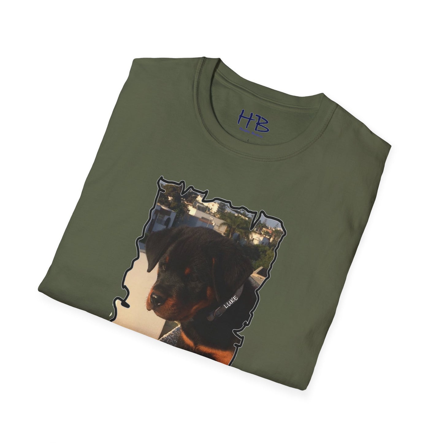 Baby Rottie Luke peeking over the roof