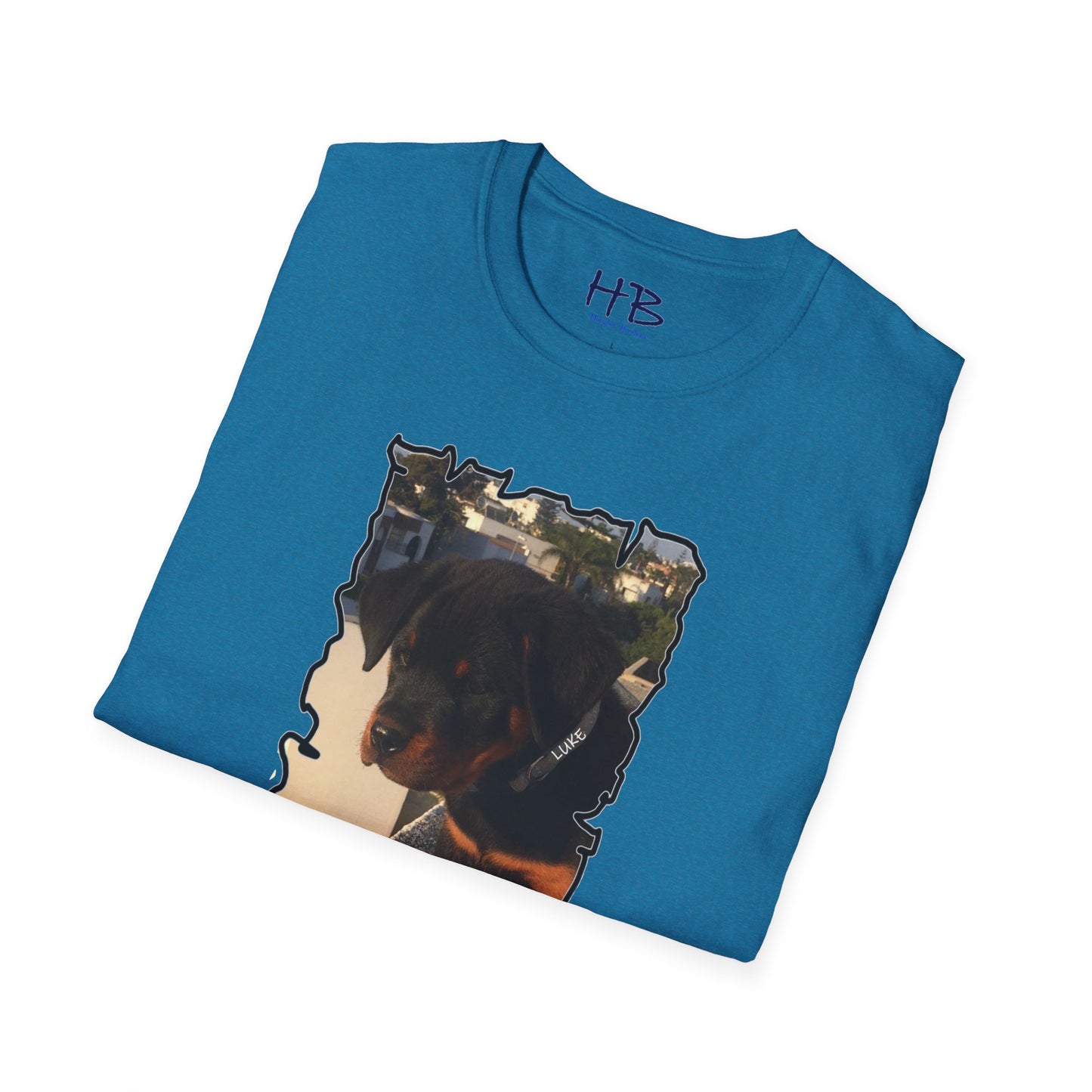 Baby Rottie Luke peeking over the roof