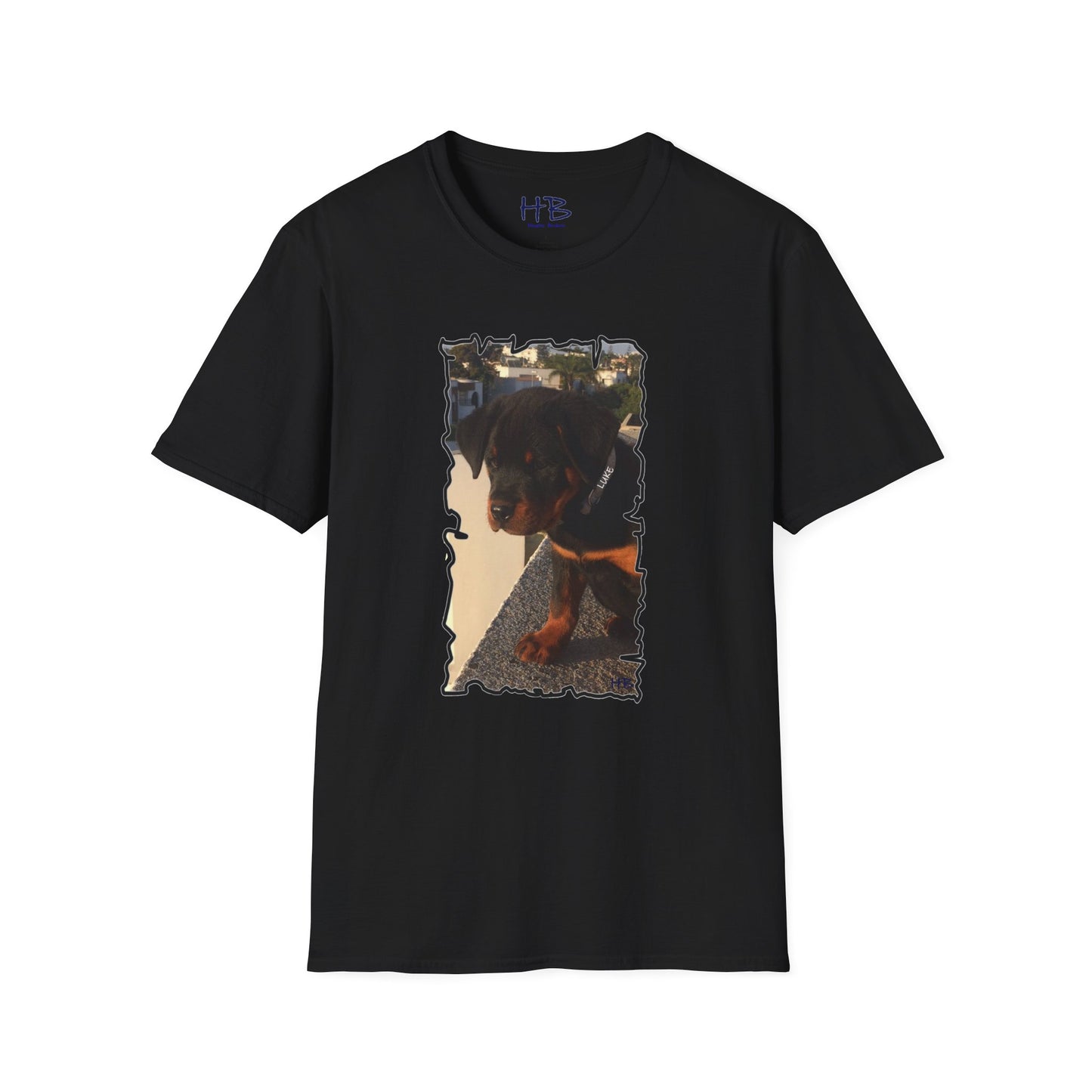 Baby Rottie Luke peeking over the roof