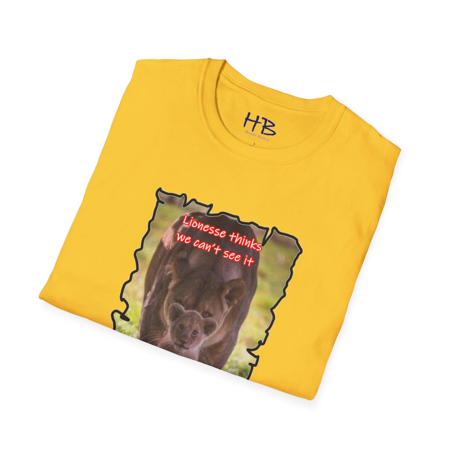 Stealthy Guardian: A Lioness's Hidden Presence Behind Baby Cub