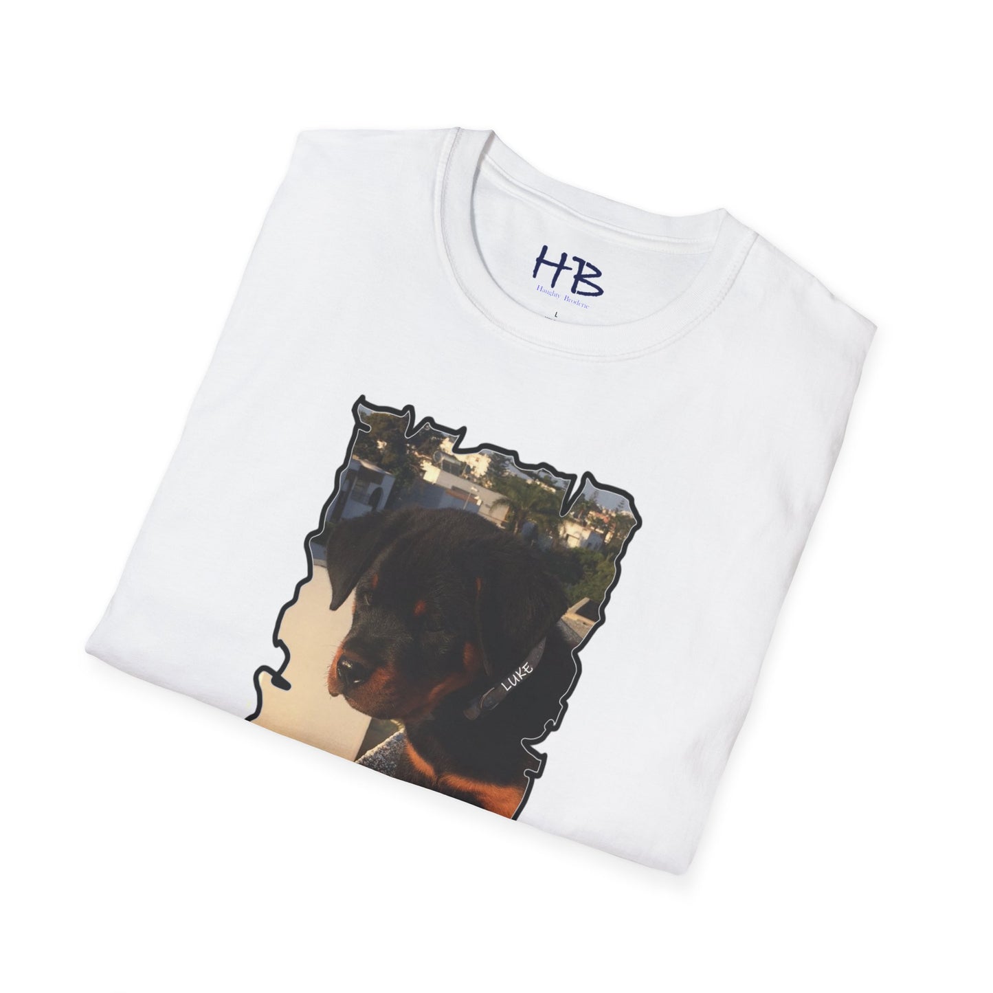 Baby Rottie Luke peeking over the roof