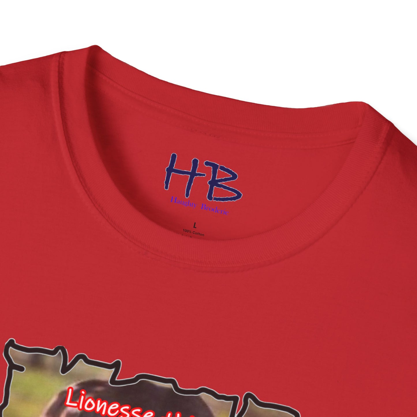 Stealthy Guardian: A Lioness's Hidden Presence Behind Baby Cub