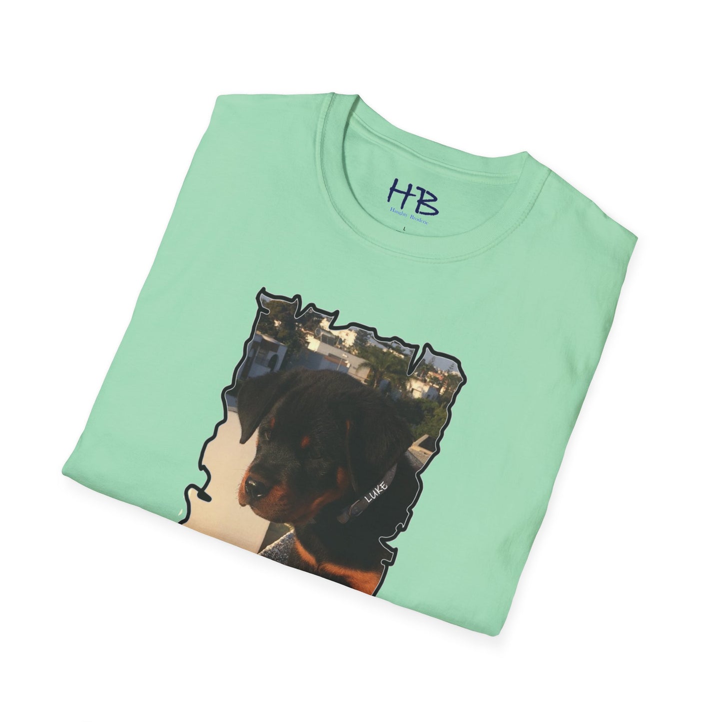 Baby Rottie Luke peeking over the roof