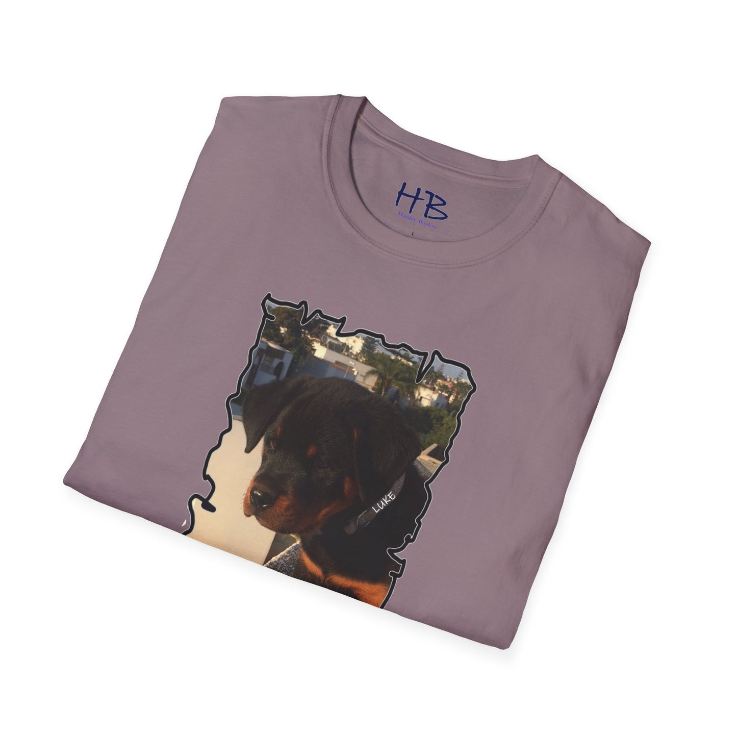 Baby Rottie Luke peeking over the roof