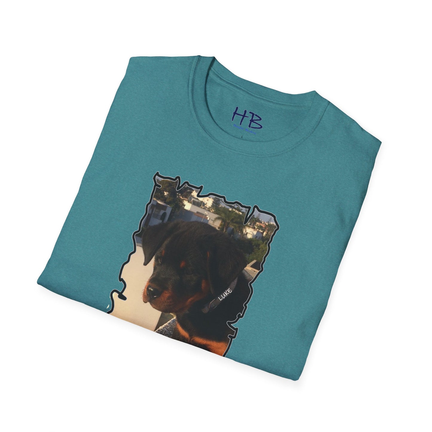 Baby Rottie Luke peeking over the roof