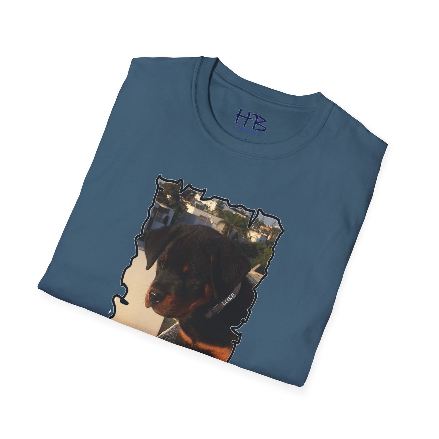 Baby Rottie Luke peeking over the roof