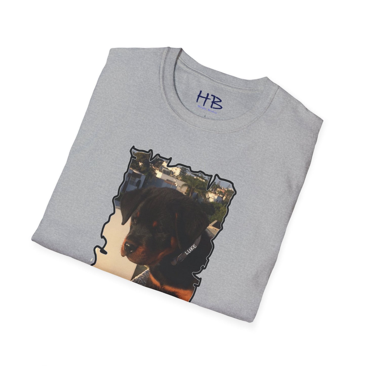 Baby Rottie Luke peeking over the roof