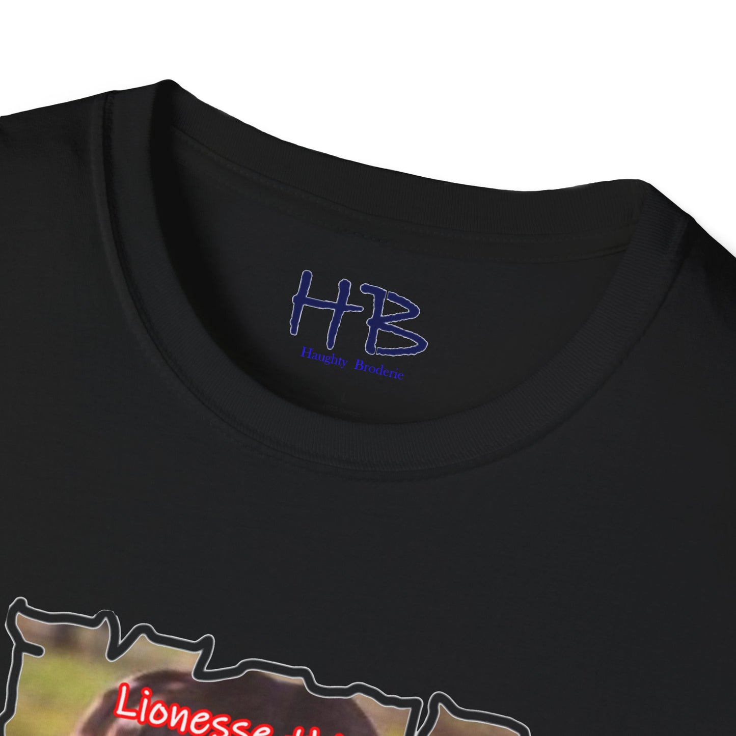 Stealthy Guardian: A Lioness's Hidden Presence Behind Baby Cub