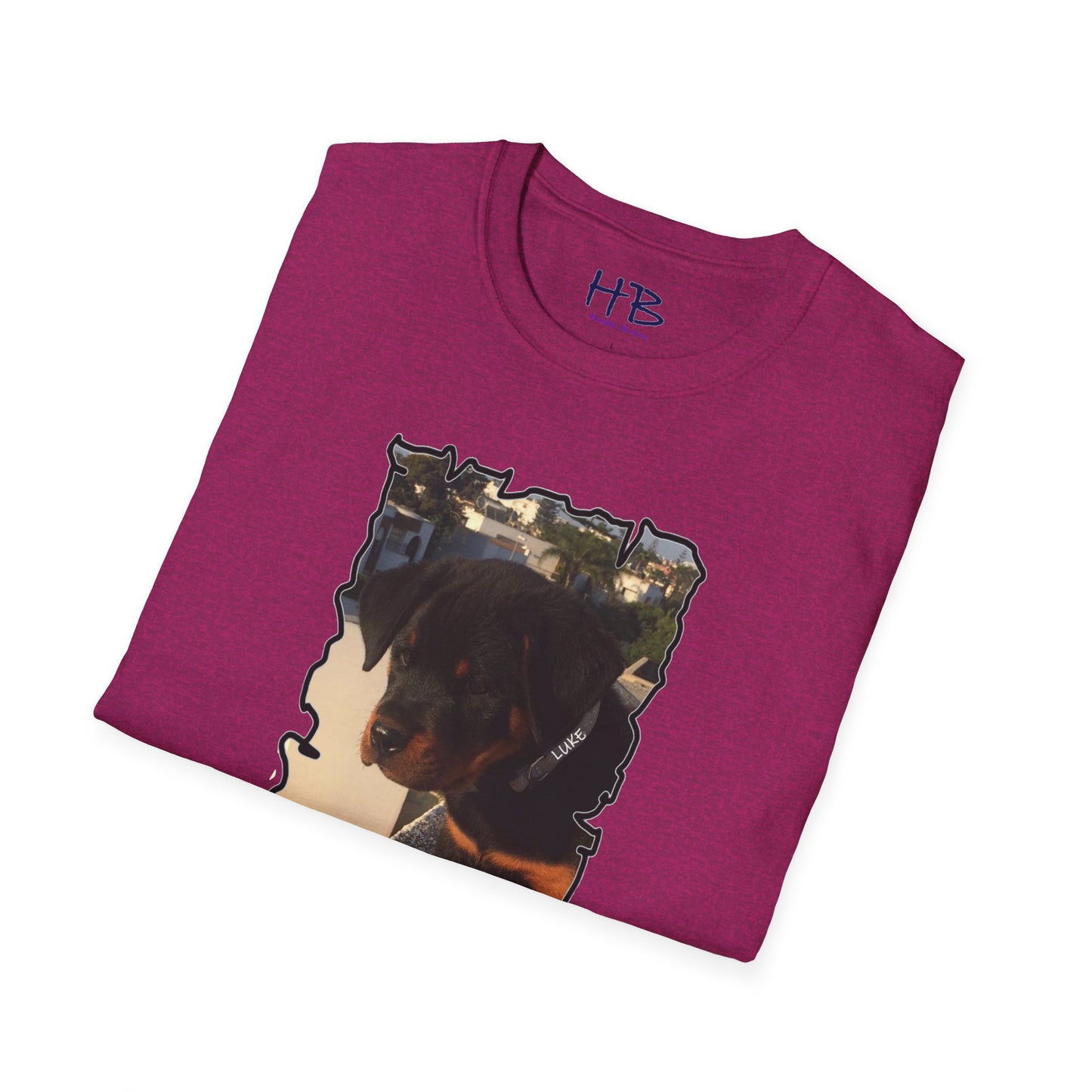 Baby Rottie Luke peeking over the roof