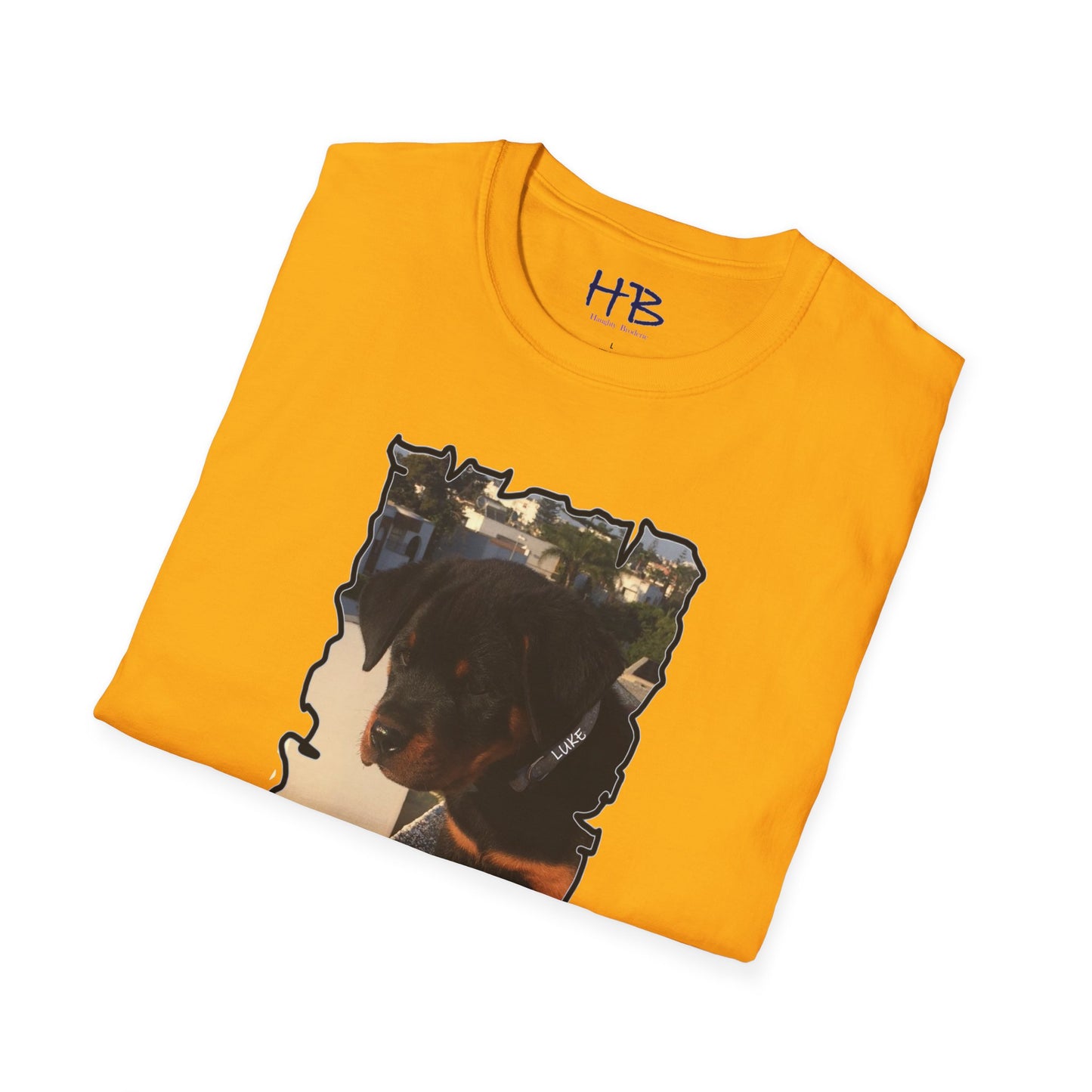 Baby Rottie Luke peeking over the roof