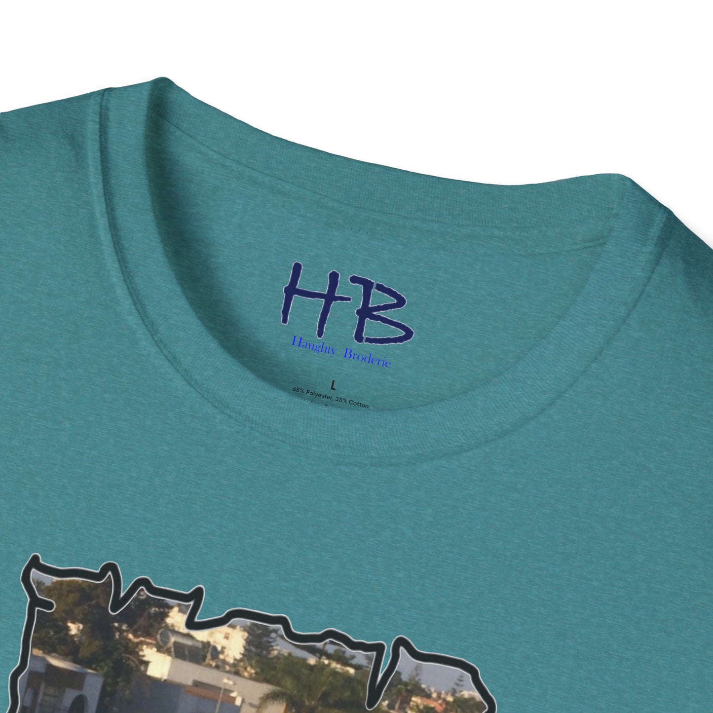 Baby Rottie Luke peeking over the roof